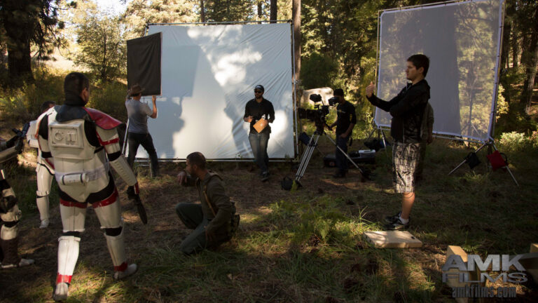 The AMK Films crew is hard at work on the set of Star Wars: Paths to Rebellion in the picturesque setting of Big Bear, CA. Surrounded by the natural beauty of the forest, the team is captured setting up equipment and preparing for an intense scene in this epic production.