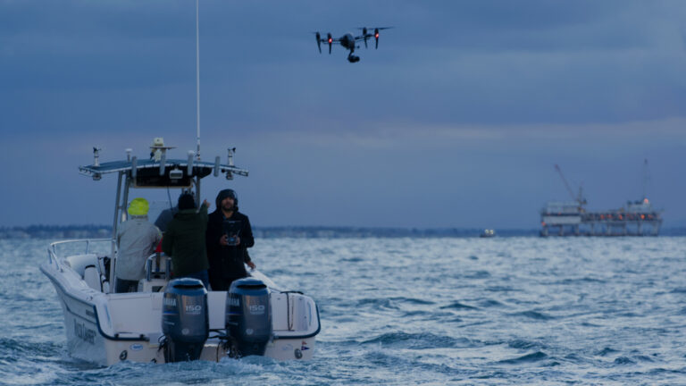 A behind-the-scenes look at Aaron Kahn and Grant Gulesserian flying the DJI Inspire 2 for Willard Marine, moments after a subtle hailstorm. The crew captures stunning aerial footage under challenging conditions.