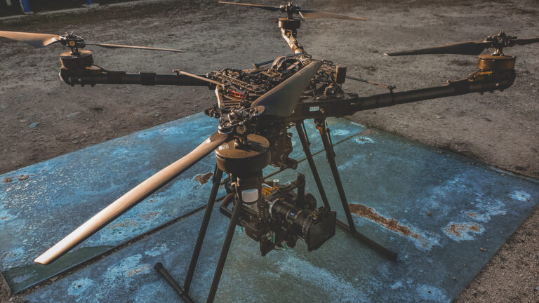 The AMK Films crew conducts a first test flight with the Alta X heavy-lift drone, equipped with the DJI Ronin 2, RED Camera, and Zeiss Zoom 21-100mm lens. This advanced setup is being prepared for capturing dynamic footage for the Anduril Ghost project. The scene showcases precision, innovation, and state-of-the-art technology in action.