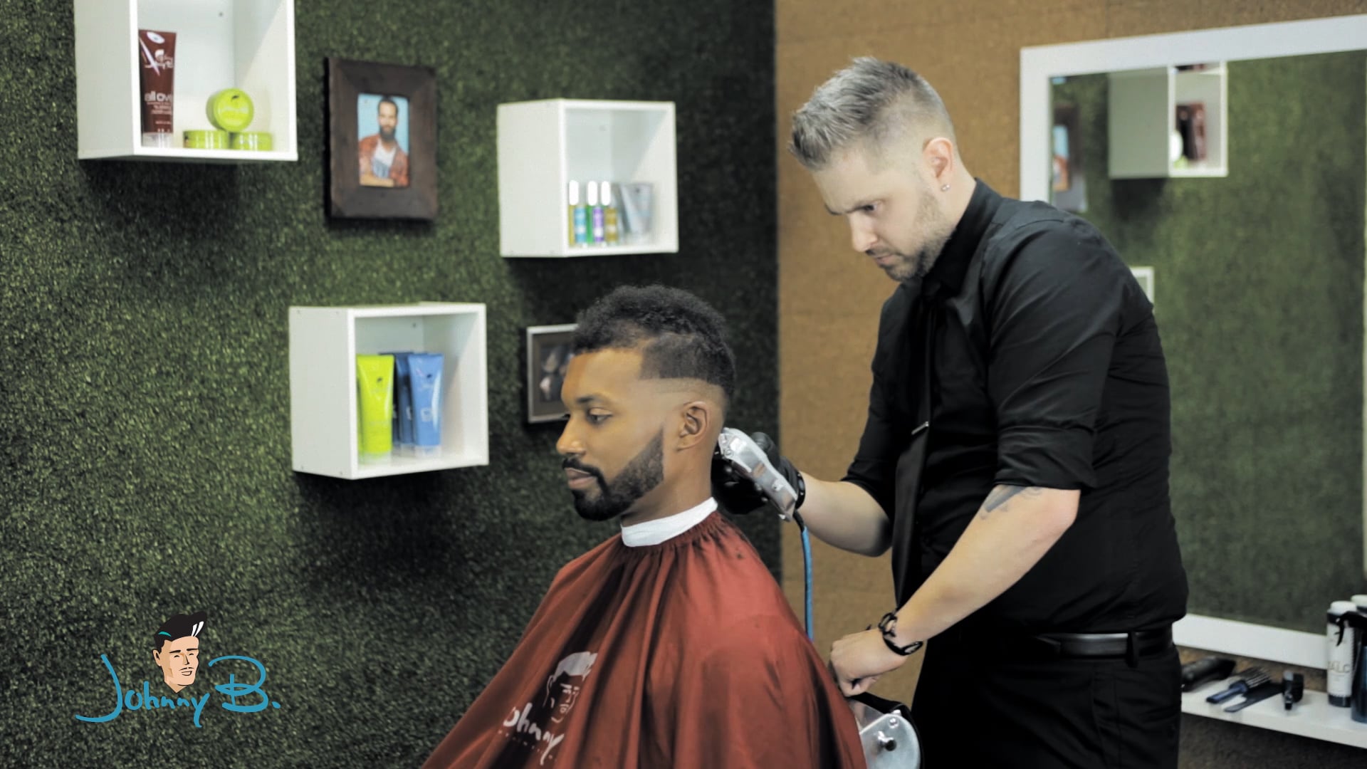 Image showcasing a tutorial produced for Johnny B Hair featuring Alan Bailey performing 'The Fade' haircut technique.